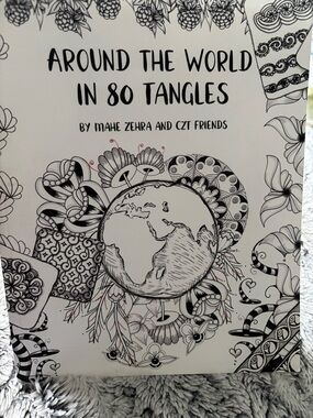 Around the World in 80 Tangles